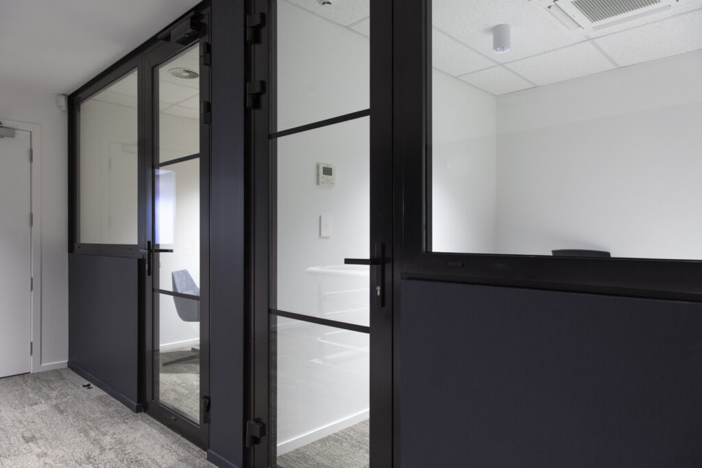 Barfoot and Thompson facade and cladding installation with aliclad, fire rated doors and windows, screens.